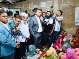 ঝড়-বৃষ্টি, কাদা আর মানুষের পাশে এক জেলা প্রশাসক